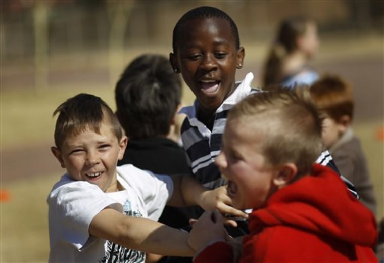 Children participate in a day camp program at the Sunwardpark Community Church in Boksburg, South Africa, on June 30.